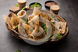 SamosaÂ Snack is an Indian deep fried pastry with a spiced filling usually made with potatoes, spices and herb